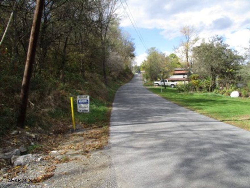 WOODED BUILDING LOT FRONTING ON PLUMB CREEK RD.  PERK TEST TO BE COMPLETED BY SELLER. SIGN ON PROPERTY.