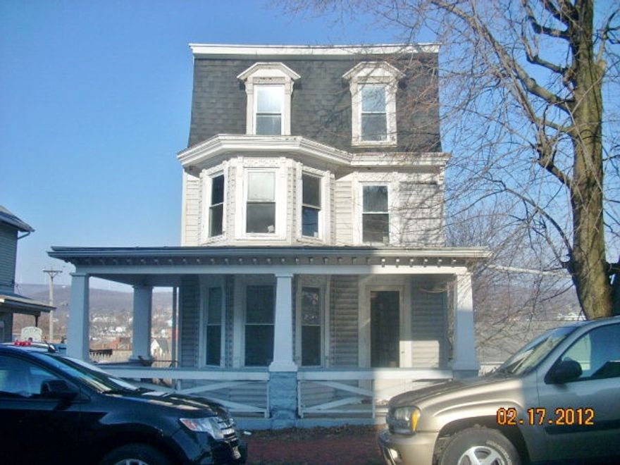 Outside this home has been renewed. It has newer siding, new thermopane windows, new rubber roof, & new electric service. Inside needs total renovation. Solid home, good foundation.