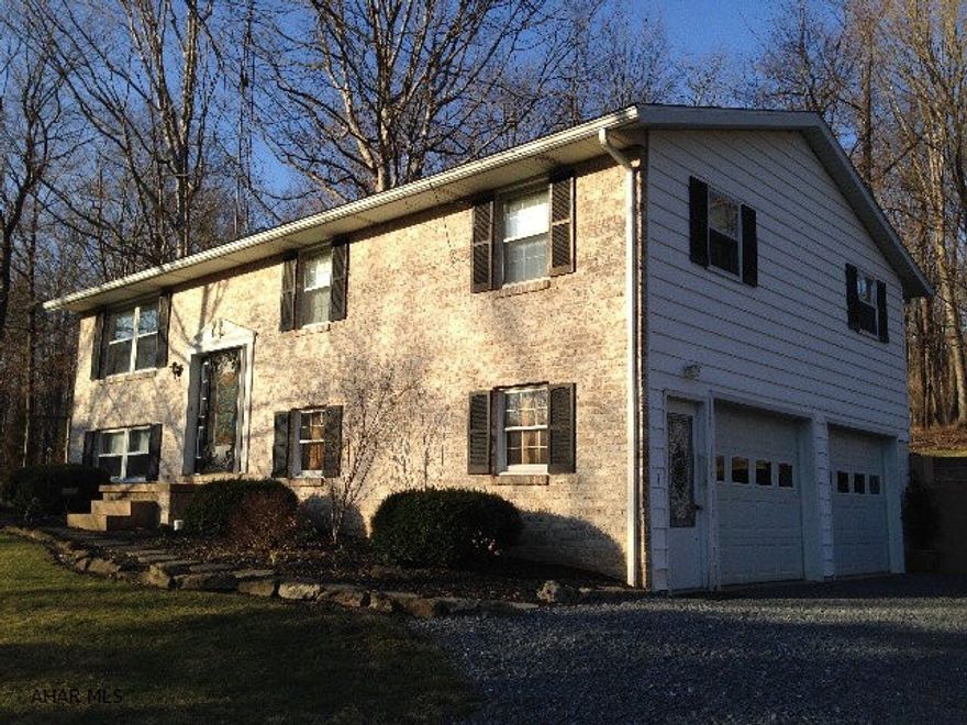 Rare find in Northern Bedford School District!  3-bedroom home on 3+ acres.  Watch the abundant wildlife from the rear deck. Beautiful location just minutes from Roaring Spring and I-99.  Across from State game lands.  2-story garage/barn for lots of extra storage or animals.  Woodburner in basement vented to main floor - will be a great supplement in the winter.  Large finished family room in the basement.  Don't miss this one!