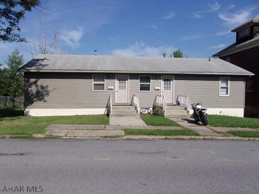 Great investment property, or live in one side and rent the other!  2 unit double house on one level each with 2 bedrooms, living room, kitchen/dining area, and full bath.  Washer/dryer hookups available in basement.  All utilities are separated by unit.  Estimated taxes for 2017 are $1213.70;  however this is only an estimate by the county and may increase.  Square footage is estimated and will need verified.  Possession of property will be UDOF and/or tenant vacancy.  Zoning is Residential/Commercial - could also be used as office space.