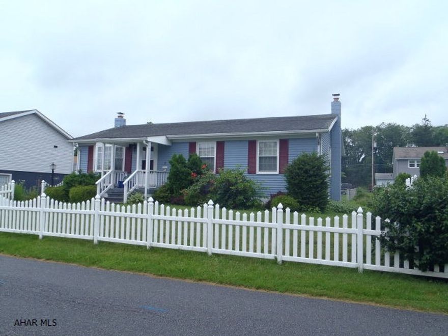 One story living in great location in Eldorado. Large kitchen with breakfast bar.  Dining area has sliding doors to deck.  Stackable washer/dryer in kitchen.  Basement has family room with woodburner and bar, 4th bedroom or office, storage room, and room with workbench area.  Two sheds and vinyl fencing.  Seller will give $3000 allowance for closing costs or appliance upgrade.