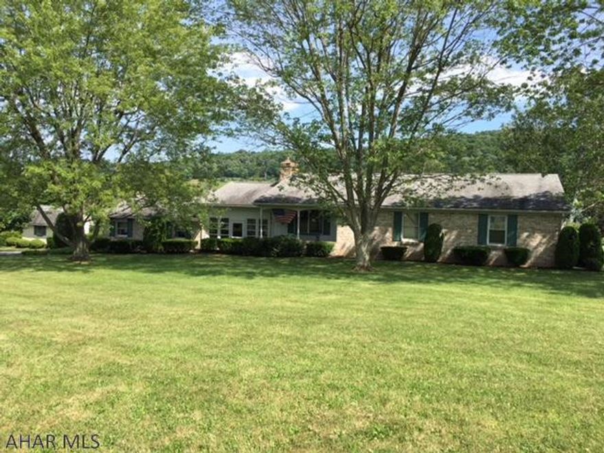 Spacious 4 bedroom, 3 bath brick ranch close to downtown Bedford but resting beautifully on 1 acre with amazing mountain views!  Enjoy the finished lower level (separate entrance, if needed), offering 1 bedroom, full kitchen, family room, and full bath. Main level offers 1 floor living, 3 bedrooms, 2 baths with large kitchen, living room, dining room areas! Combo heating includes electric, oil, coal, propane. Beautiful home!  Call today!