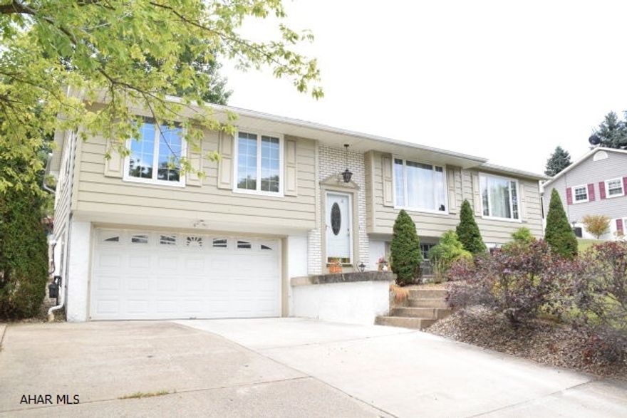 MOTIVATED SELLER!!!   Beautiful super-sized bi-level in Penn Farm Estates.  So many upgrades!  The kitchen has quality cherry cabinets and adjoins a charming breakfast room.  Huge living room has gas fireplace and french doors to patio.  Convenient main floor laundry area.  The spa bathroom features a jacuzzi tub, walk-in shower, high end ceramic tile and Italian marble.  Recently completed basement has two large rooms with plenty of light to use as you please.  Could be fifth bedroom.  Central air.  Tasteful, neutral decor.  Oh, did I mention it is immaculate?  You don't have to do a thing but move right in and enjoy.