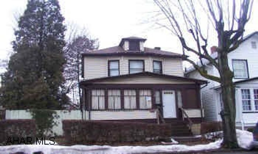 Spacious home with fireplace, hardwood floors, double lot, 2 car garage.  Needs TLC.  Lots of potential. Spacious home with fireplace, hardwood floors, double lot, 2 car garage.  Needs TLC.  Lots of potential.