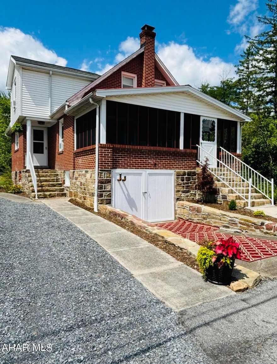 Come and enjoy this beautiful, charming two story brick craftsman style home in the sought after Hollidaysburg School District.  
 This home will draw you in with the country setting and beautifully landscaped surroundings.  This home offers a Large eat in kitchen, large living room, and 4 spacious bedrooms.  
Other great features of this home are hardwood floors, a large screened in porch, replacement windows, a firepit, and many renovations were completed less than a year ago.  Schedule your tour today!!