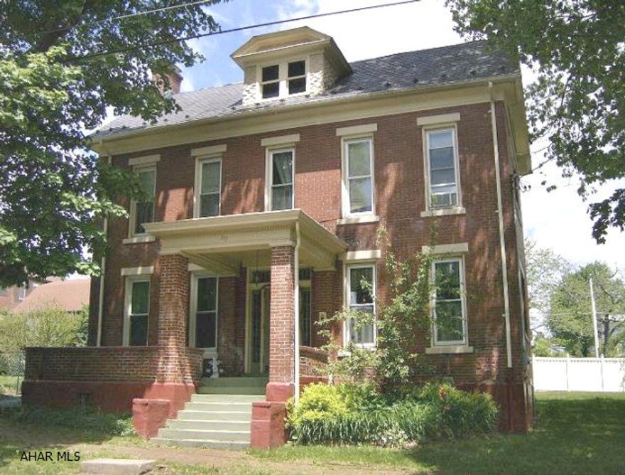 5 BR, 1 1/2 bath, 2 1/2 story brick home with lots character on a 72x93 lot. Eat-in kitchen & a fireplace in the living room. Gas hot water heat.