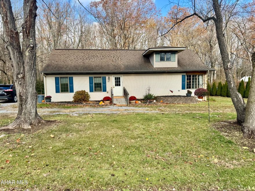 Welcome to this spectacular move-in ready 4-bedroom, 2-full bathroom home, transformed with a fresh and modern aesthetic across 1,878 sq. ft. Designed for comfortable main floor living, the house features dramatic high ceilings and abundant natural light thanks to thoughtfully placed skylights. The interior boasts exceptional storage with lots of closet space and includes two full bathrooms, notably a very large primary bath. A unique architectural highlight is the loft space overlooking the main living area, perfect for a dedicated home office. Outside, enjoy a nice-sized yard with an outdoor patio, a perfect place for a bonfire pit, and a separate garage, all on a property that is turnkey! 2 deeds included in the sale of this property- the garage is deeded separately.