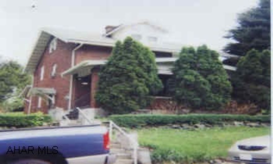 2 STORY CLASSIC BRICK ON LARGE 125X120 CORNER LOT WITH 1 CAR DETACHED GARAGE.  LOVELY BRICK. NEEDS UPDATED BUT CLASSIC STYLE WITH HUGE CORNER LOT. GREAT LOCATION. HOME WARRANTY. NO SHOWINGS UNTIL SAT. 5/17.