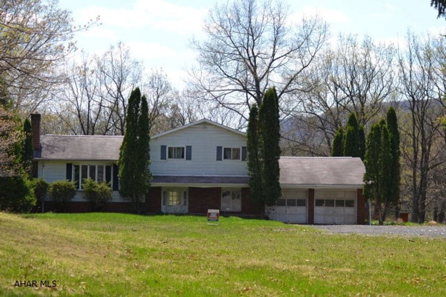 Nice house on 16.2 acres in Logan Township.