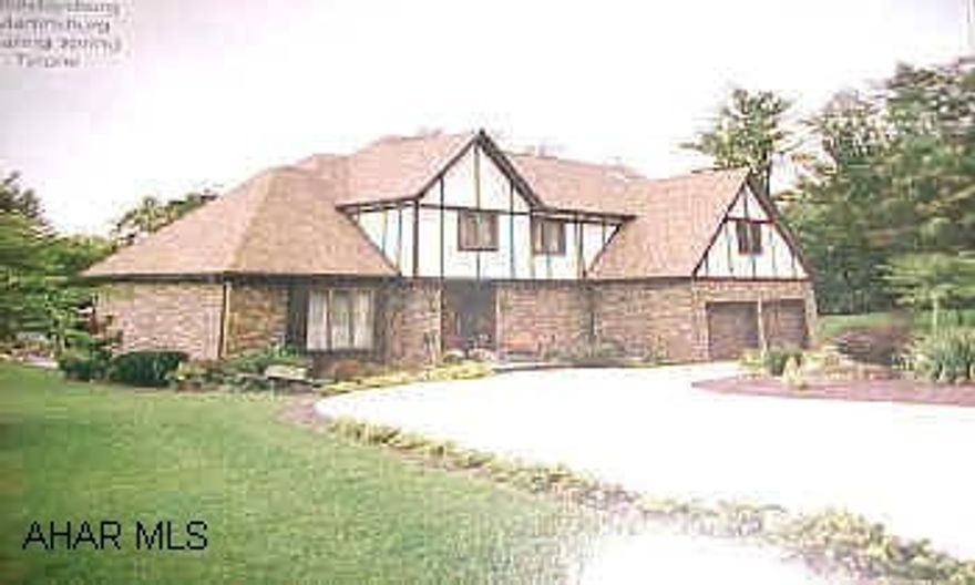 very immpressive 2 story tudor on 1 acre, indoor pool room with exercise room adn wet bar, terrific for entertaining, great oak, eat in kitchen, formal dining room, 2 family rooms, fireplace, 5zone heating-energy efficient