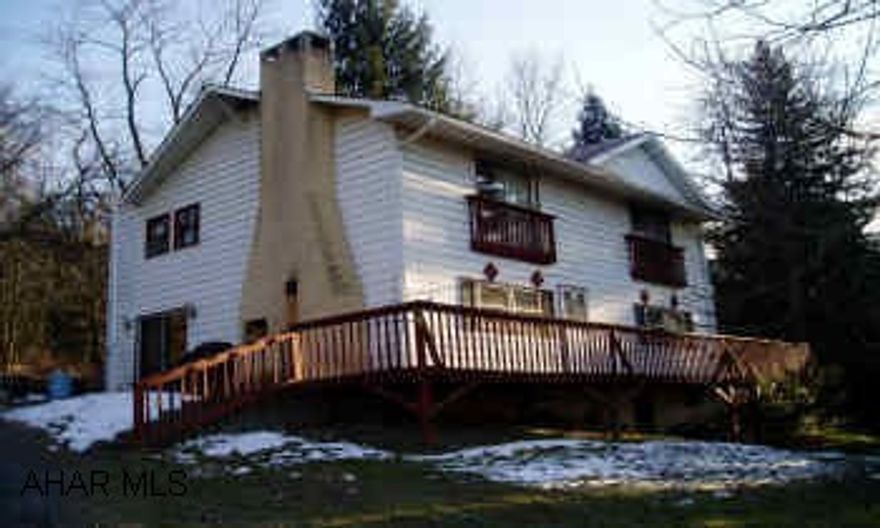 Large 2-story Frame/Aluminum with 8 rooms, 4 bedrooms, 1 12/2 baths on nearly one acre lot. Renovated and expanded in 1976. Fireplace w/wood insert in living room, main level laundry w/washer and dryer. Just 6 miles from I-99 and Wal-Mart Distribution Center.