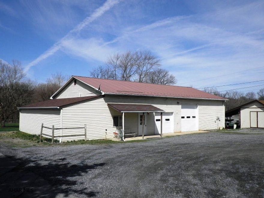 Ideal as a Home Base for a business - has office space, a 3/4 bath & ample storage for your business equipment, business vehicles & supplies.  Ideal for a workshop.  Ideal for warehousing.  Building is 36+-' x 75+-', built in 1992; and, it has electricity, is insulated & heated & has public water & public sewer.  Plus, there are 3 OHD's, floor tie downs & a storage mezzanine.