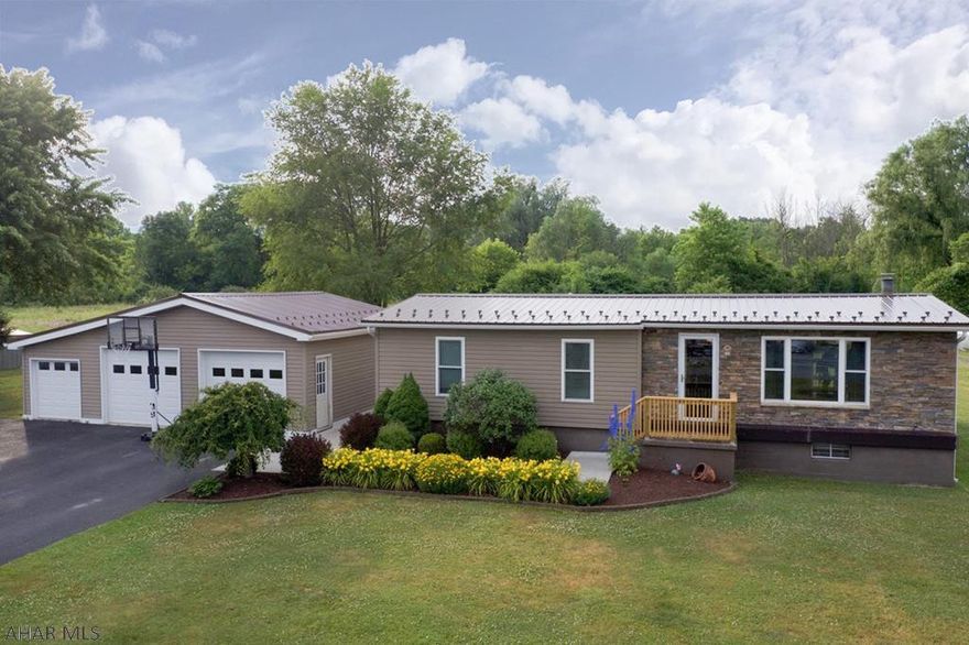 Hopefully you are ready for everything this perfectly updated home has to offer!  The main level has been completely updated and features new hardwood flooring, drywall, and insulation.  The kitchen, dining area, and living area are open to one another.  Kitchen appliances are included as well as the wood-burner.  On the same floor there are 3 bedrooms and 1 full bath.  The home has a full basement with half bath, utility room, bar, included pool table, and still has plenty of extra room for entertaining.  The home has a new roof (approx 2 years old), central air, new shed, fire pit, large flat yard, and best of all a HUGE 3 car detached garage.  The garage has updated electrical and lighting and includes a workbench and shelving.  The yard has an electric dog fence in place.