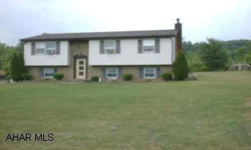 LOVELY BI-LEVEL WITH 2 BR, 1.75 BATH.  POSSIBLE 3RD BEDROOM ON LOWER LEVEL.