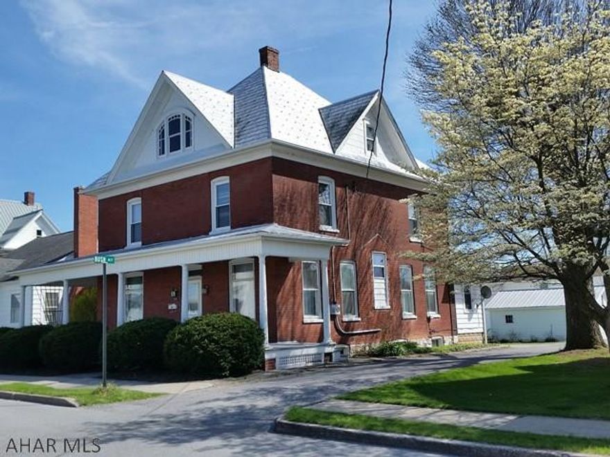 Great 2 1/2 story brick home, 4 bedrooms, 3 baths, hardwood floors, natural woodwork, 2 sets pocket doors, spacious eat-in kitchen, 1st floor bath, electric breakers, wraparound porch and detached garage. Estimated 2017 tax assessment $2,096.00.   #J-268