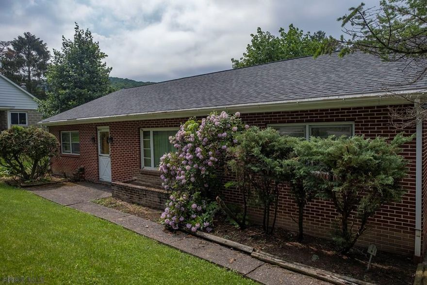Well maintained three bedroom, one and a half bathroom home located right across from the Penn State Altoona Campus. This home features a spacious kitchen with plenty of natural lighting. Enjoy your morning coffee in the sunroom right off of the kitchen. Three spacious bedrooms and a full bath are located on the first floor. Downstairs you will find a finished basement with an additional bathroom and standing shower. One car integral garage and plenty of off street parking in the back of the house. Dont miss out!
