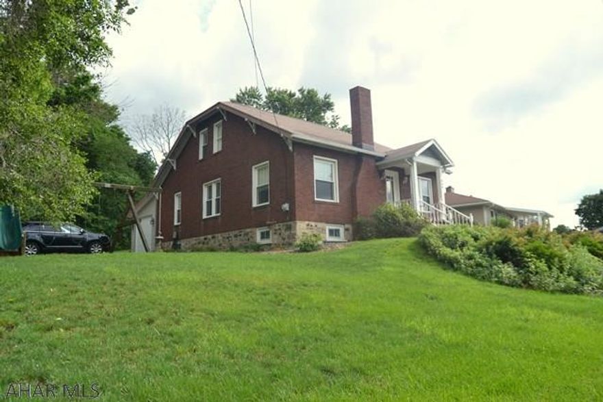 This updated brick home is a must see! Remodeled kitchen with granite counters,  farm sink and stainless appliances.  Clean, bright and ready to move in!