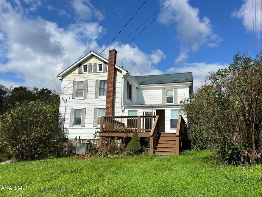 Located in the heart of beautiful Hartslog Valley, Huntingdon County is this charming, rare find! There are so many options for this 10.3  property, with it's close proximity to Raystown Lake and all it's outdoor activities you could make it your summer getaway with lots of space to store your boat and/or RV.  It's also conveniently located to State College and Altoona, and would make a great place to stay for those PSU football weekends!  Are you a hunter? Why not use it as a hunting lodge?  The property consists of a large 3 bedroom, 1 bath farmhouse, barn, shed, and almost 2 acre stocked pond, where geese, turtles and other wildlife can be seen.  The kitchen was recently updated, along with a sunroom and deck with amazing views of the pond.  A heat pump with A/C was added in 2017 for your year-round comfort. The barn is original with hand made logs and it has a large barn floor for storage or hay and the bottom has several areas for animals or just use for additional storage.  Take a look for yourself and imagine all the possibilities this great property has to offer.