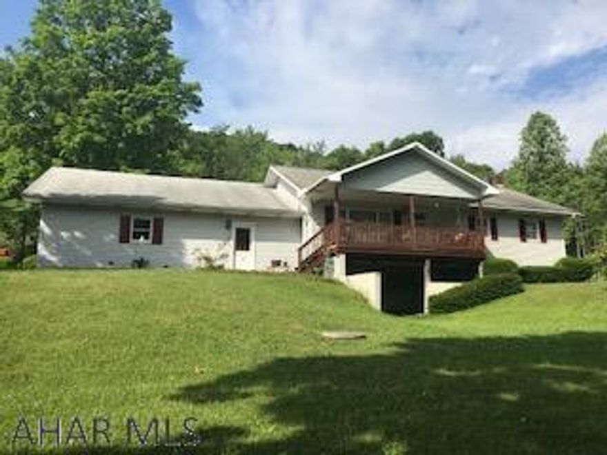 1.9 acre lot with beautiful well maintained home with huge 3 car garage. Eating area in the kitchen. Basement is finished with bar and family room, storage area,  walk out basement. New carpet in 2 bedrooms, newer furnace, sun room is heated on basement zone.