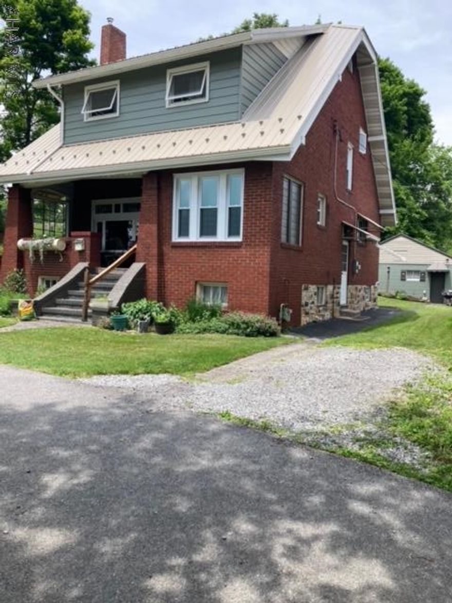 Very well kept three bedroom two bath brick home with a large private yard located at the end of a quite street. Enjoy views of the valley and mountains from your from porch. There is a large detached and workshop. Pellet stove and all major appliances are included with several having transferable factory warranties still remaining. Call today to schedule your showing.