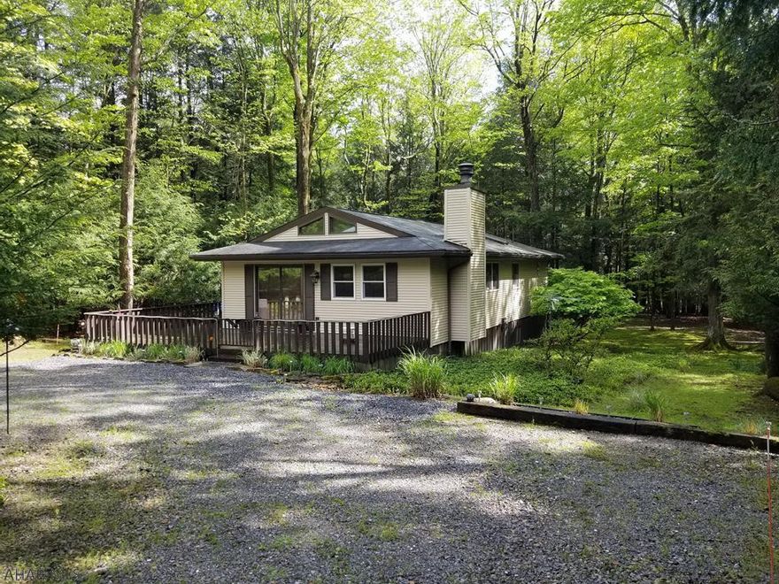Cozy 1 story cabin with 3 bedrooms and 2 bathrooms on 1.5 wooded acres in Glendale Yearound. This cabin is perfect for that weekend getaway or even a full time residence. Everything being on 1 floor makes it super convenient and simple. Kitchen and living share an open space together with a real fireplace for those cold and rainy nights. Master bedroom and master bath with 2 smaller bedrooms and common bathroom. A sun room in the back of the house is private with a great view of the woods. Strategic skylights give you lots of natural lighting and help save electricity. Spacious deck in the front runs down one side and covers the back. Glendale Yearound is a gated community minutes from Glendale Lake and Prince Gallitzin State Park. Community pool, basketball, tennis, horseshoes, and more.
