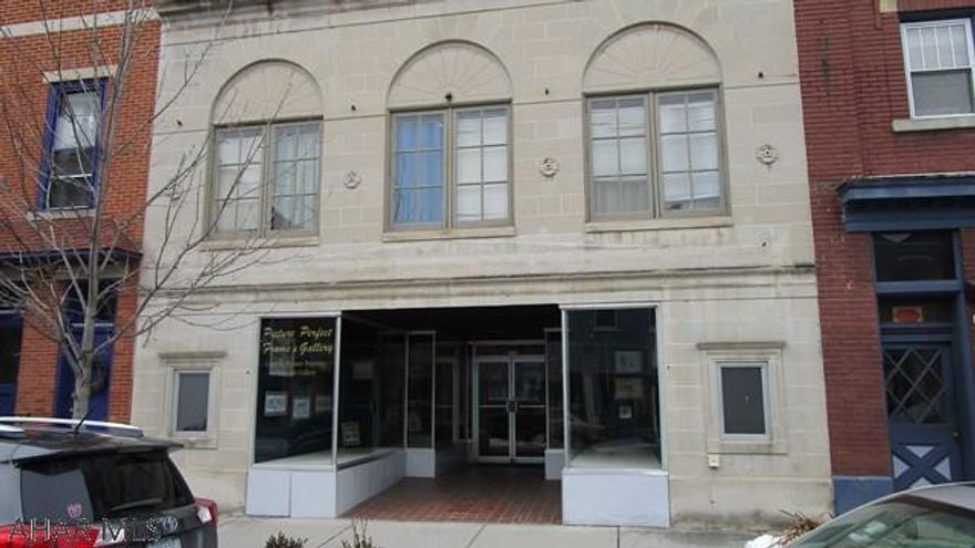 So many possibilities exist in this unique building in beautiful uptown Hollidaysburg!  Years ago this building was a cinema and is currently a framing shop - could house any number of different businesses.  The walls can be relocated for separate office spaces or removed for an open floor plan .  Second floor (what used to be the projection booth) is now used as a charming artist's loft.  Seize this opportunity in this thriving and historic location!  4 off-street parking spots.  Approximate square footage is 3200.  Taxes and square footage are estimated.