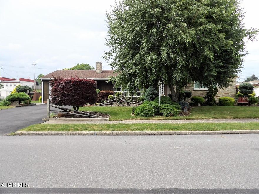 Welcome to 817 New Street in Roaring Spring, PA!

Set on 0.43 beautifully landscaped acres, this spacious home is full of possibilities. With 3 bedrooms and 2.5 bathrooms, you'll find plenty of room to live, work, and relax.

The main level features a bright kitchen that opens into a large great room with direct access to the backyard oasis, which includes a lovely gazebo and a pergola-covered patio area—perfect for shaded outdoor seating, entertaining, or relaxing.

Just off the kitchen, there is a cozy office nook that leads into a second expansive great room, offering flexible space ideal for a family room, playroom, or hobby area.

A generously sized flex room provides even more options and could serve as an additional bedroom, formal living space, or home office.

Upstairs, enjoy the convenience of a dedicated laundry room, while a former laundry hookup in the basement adds extra flexibility.

The finished basement is designed for fun and functionality, featuring a half bath, a big entertainment room, a second living area, and a dedicated exercise room. The bar area, complete with a refrigerator, stove, sink, and a pull-down projector screen for movie nights, makes hosting gatherings a breeze.

While the interior retains some dated charm, the home has been lovingly maintained and is ready for your personal touch.

Outside, enjoy the gazebo, relax under the pergola-covered patio, and take advantage of two sheds for extra storage—all surrounded by a beautifully landscaped yard.

Buyer to verify square footage, taxes, and all property details. Property sold as-is.

Don't miss this opportunity to own a spacious, versatile home with so much to offer in Roaring Spring!