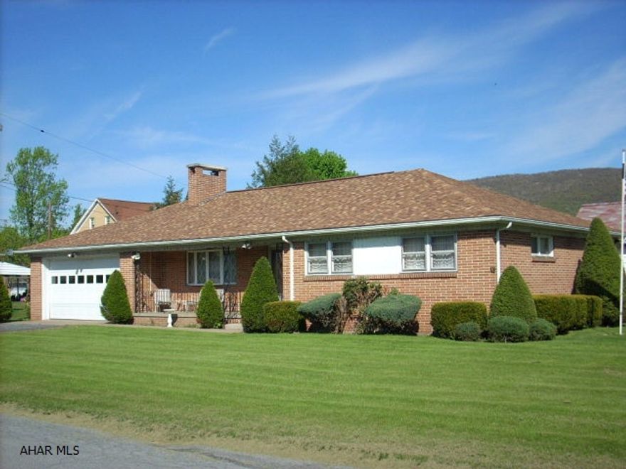 Large corner lot, brick ranch home and 4 car garage; 2 car attached and 2 car detached.  2 Storage Sheds.  Newer roof and mechanics, central air.  This home was built in 1962; the interior is the original kitchen and bathrooms; plenty of storage areas throughout home.  2 Heat systems; gas hot water and electric heat pump.