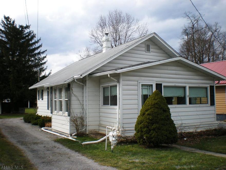 Down sizing, first time home buyer, preference for Bellwood Schools or just simply tired of renting then this property should be on your list.  One Story Living featuring; Central A/C, Gas Forced Air Heat w/Humidifier, Hardwood Floors, enclosed/carpeted/heated Front Porch/Sun Room, Covered/Screened Rear Patio, Car Port  and a Circular Driveway.  Property has Public Sewage (provided by Bellwood Water & Sewer Authority) and currently has Well Water. New Owner will be required to connect to Public Water (provided by Bellwood Water & Sewer Authority). Seller is in the process of obtaining estimates to connect to Bellwood Water Authority Service.