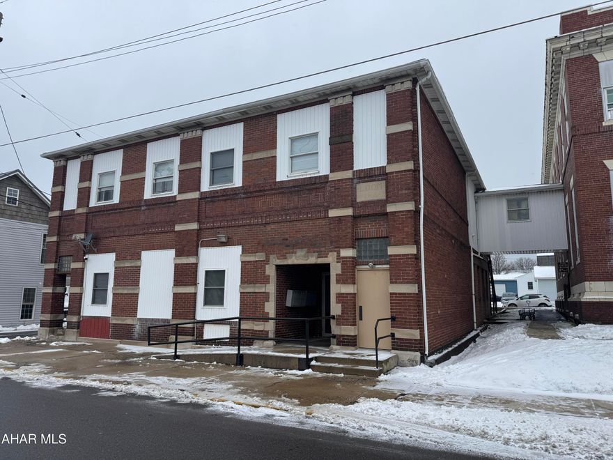Brick 11 unit apartment building that has undergone extensive updating over the years. Tenants pay utilities. Separate electric and heat. Rents are far below market rates. Includes parking lot at the rear of the building. Quality building.
