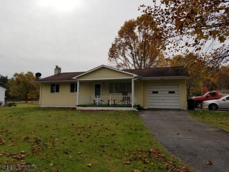 3 bedroom rancher on 1 acre corner lot near Bellwood. 1 car attached garage.