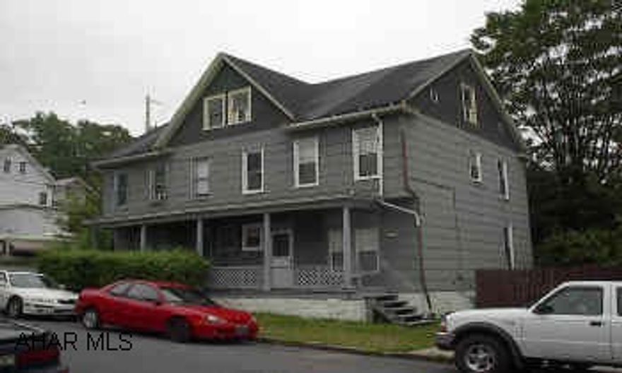 Large double house, one side rented and the other side ready to rent. Owner ia a realtor.  413 side has vinyl replacement windows.Separate utilities