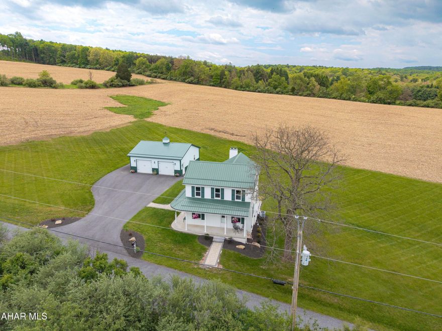Escape to your own private oasis with this beautifully restored country estate nestled on 12 +/- scenic acres in the heart of Bedford County. Thoughtfully transformed from the ground up, this exceptional property blends timeless character with luxury modern upgrades, breathtaking countryside views, and the kind of peace that is becoming increasingly rare to find.

Wake up each morning to rolling country views, the peaceful sound of birds chirping, and sheep grazing nearby, a setting so serene it is difficult to fully capture in words. From the moment you arrive, the property offers a sense of calm and privacy that makes everyday life feel worlds away from the stress of everyday living. Whether enjoying coffee on the wraparound porch, watching the sun rise over the countryside, or relaxing in the quiet evenings surrounded by nature, this property was designed for those seeking peace, beauty, and space to truly unwind.

Beautifully landscaped and surrounded by scenic mountain and countryside views, the setting feels like your own private retreat while still offering the comfort and convenience of a fully renovated home in turnkey condition. Conveniently located with easy access to the Pennsylvania Turnpike, Interstate 70, and major travel routes, the property allows convenient access to Washington DC, Virginia, and Maryland while still enjoying the tranquility of country living.

Bedford County is known for its historic charm, scenic countryside, beautiful covered bridges, mountain views, and peaceful backroads that make this area one of Pennsylvania's hidden gems. Rich in history and natural beauty, the county offers a lifestyle filled with small town charm, outdoor recreation, and breathtaking scenery year round.

12 beautiful scenic acres
Oversized insulated garage with utilities
Extensively renovated
Luxury kitchen and baths
Professional landscaping and hardscaping
Wraparound porch with stunning countryside views
Peaceful country setting filled with natural beauty
Turnkey condition

A rare opportunity to own a private Bedford County retreat where all the hard work has already been done and the peaceful lifestyle you've been dreaming of is waiting for you.