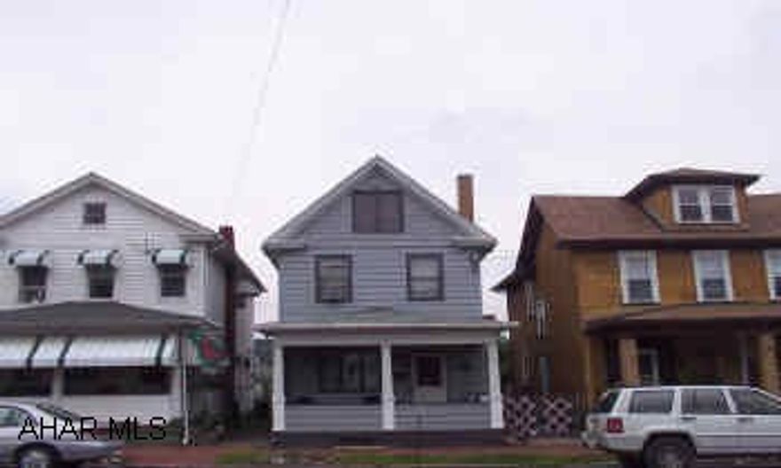 Charming 3 bedroom with first floor laundry, eat-in kitchen, finished heated attic.  Just move in!