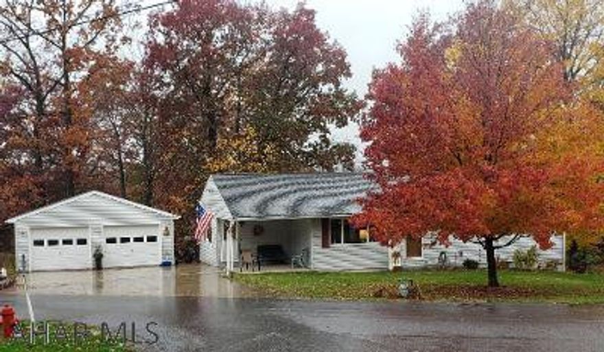 Vinyl-sided 4-bedroom 2-bath rancher with detached 2-car garage in beautiful neighborhood.  Kitchen has quartz counters & lots of cupboards w/pull out drawers.  Basement Family Room has electric fireplace and there's lots of cupboards & builtin closets.  Vinyl replacement windows & newer replacement doors.  J-526