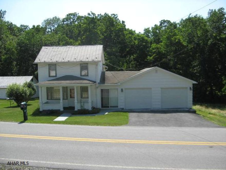 This well maintained 2-story would make the perfect starter home or a good get-a-way place.  The large attached 2-car garage, coal/oil/wood furnace, and nice back yard are just some of the reasons to make this property your new home.