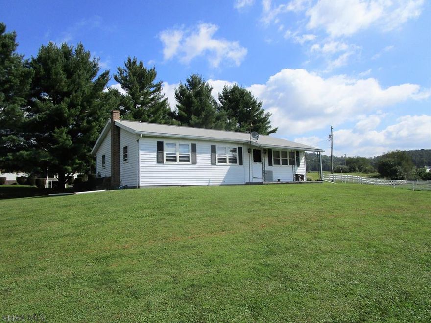 This is a gorgeous property; very scenic, rolling and consisting of 62.812 acres!!!  Approximately half of the acreage is cropland, the remainder is pasture (fencing) and woods along with two wells on site.  There is a ranch home with 3-bedrooms, 1.5-baths, living room, kitchen and a dining room.  Full basement, electric BB heat along with a wood stove and 200-amp electric. 40' x 70' bank barn w/ a concrete block foundation and metal siding.  There is also an accessory unit on site that is a 3-bedroom mobile home resting on a full foundation. If you enjoy the scenic beauty of the outdoors, this will definitely suffice!!