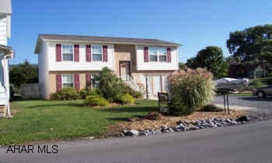 Wonderful split entry features extra large lot, landscaped w/4 level deck. Hot tub, above ground pool. Interior features living room opened into eat in kitchen, 2BR & BA, F.R. & 3rd Br lower level. Beautiful split entry, almost brand new home. Welcoming floor plan & fabulous landscaping. The backyard is fenced & has a 4 level deck, brick firepit, hot tub, above ground pool & more! Call Sue Hughes for all the details!