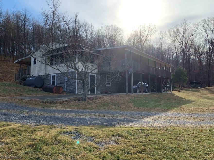 Priced to Sell!!  Spacious Doublewide has 3  bedrooms, 2 full baths on 4.98 acres just minutes from Bedford.  Covered front and back porch and a sunroom.   Off the Master bedroom is a bonus room for added living space or storage. All appliances stay.  Service for back-up Generator, new oil tank and new well head. Furnace is less than 5 years old.  Newer full size stand up shower in the Master bathroom.  200 Electric amp service.  2 storage sheds and approx. 2 acres of yard.  The title has been recently retired.