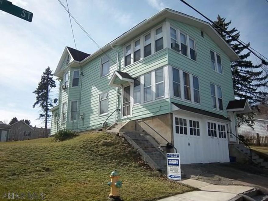 Great unit in awesome location. Could live in one unit and rent the other or both units could be rentals. Opportunity to turn this into great investment or large single family home. Six bedrooms, 2 full baths plus detached garage. Priced to sell.