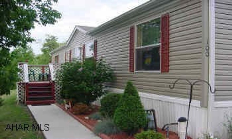 Off 764 turn right into Camelot Estates, go past mail boxes turn right onto Clairmont Drive, go straight to top of hill onto Thunderbird Drive home sits on left with two yellow markers at driveway. Many inside and outside amenities, largest lot at edge of park, access to Logan Township park, Ceramic Tile floors and counter tops. Two decks front (8x10) rear (14x40). Two car cemented driveway, outside shed (10x10). Sidewalks  and home  is wired for surround souind Just beautiful and well maintaned.  Must see!Call Hank  Call L/O to show 24hr. notice.