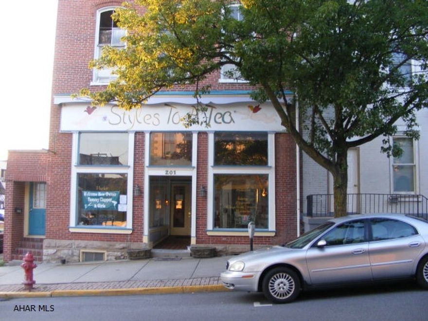 Beauty shop leased for $1300.00 month. Basement apartment rents for $500.00 month. 2nd and 3rd floors down to studs - could be 2 or 4 apartments upstairs. New roof.