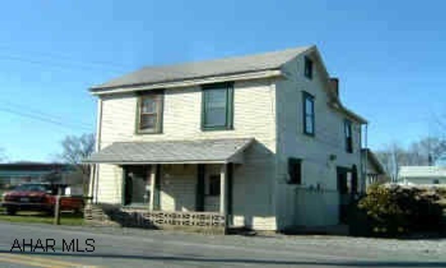 2 story, 3 bedroom, 2 full bath, in East Freedom. Spring Cove schools.  Close to I-99. 1750 sq. ft. of comfortable living.  New bathrooms, plumbing,  wiring, water treatment system, newer carpeting. Nice yard.  Come and see !  Could be made into duplex. Must come and see to appreciate the charm of this spacious 1750 sq.ft. home.  Many updates. 1st. floor has Foyer, Living Room, Family Room, Large Eat-in kitchen with working fireplace, Full Bath, unheated mudroom with laundry hook-up.   2nd floor has  3 Bedrooms (one captive),  Full Bath, and laundry hook-up available. Carpet like new. Carport. Off street parking.  Partially fenced yard. Exterior is old wood siding. Old shed on lot.