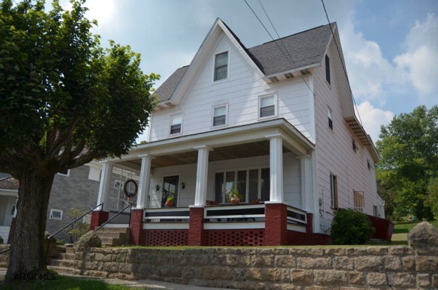 Beautiful home with lots of room.  Walk up attic with lots of storage.  Detached brick garage with bonus room on top.
