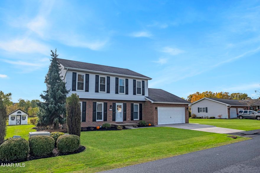 Welcome to 629 Aspen Lane - Where Style Meets Comfort in Woodland Terrace! Nestled in the desirable Woodland Terrace subdivision of Duncanville and within the sought-after Hollidaysburg School District, this move-in ready gem offers 4 spacious bedrooms, 2.5 updated baths, and over 2,150 square feet of beautifully refreshed living space. Step inside to discover a flowing floorplan featuring a formal dining room, a bright living room, and a cozy family room with a charming fireplace that leads to a private patio retreat - perfect for entertaining or unwinding. The owner's suite boasts a private bath, while the kitchen shines with brand-new stainless steel appliances and modern fixtures. Enjoy the ease of a 21'x22' attached garage, a handy shed, fresh paint throughout, and stylish new flooring that ties it all together. Clean, crisp, and full of natural light - this is the home you've been waiting for!