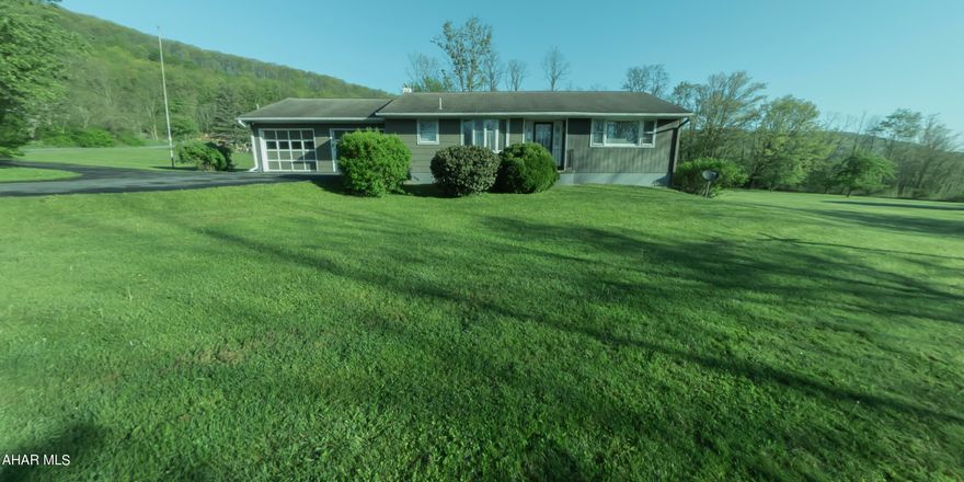 Welcome to this exquisite ranch-style home nestled on a lush 1.07-acre lot in the picturesque Hobbit Hollow neighborhood in Tyrone Township. 127 Hedberg Lane boasts a harmonious blend of comfort and convenience, making it a true gem in this scenic community. Interior Highlights: Living Room: Bask in natural light from the large window offering views of the beautifully manicured southeast lawn. The room is finished with elegant hardwood flooring, creating a warm, inviting atmosphere. Kitchen: Culinary enthusiasts will appreciate the vinyl flooring, generous counter space, and modern appliances including a gas range, built-in dishwasher, double stainless steel sink, and refrigerator. Bathroom: Features practical tiling, a shower over tub, and safety-enhancing grab bars at the toilet and bath, blending functionality with style. Additional Features: Two-Car Garage: Ample space for vehicles and additional storage. Covered Rear Patio: Perfect for relaxing and entertaining outdoors. Flexible Space: The lower level offers a potential fourth bedroom, ideal for guests or as an office. Utilities: Equipped with oil heating, gas for cooking, and hot water, ensuring comfort throughout the seasons. All-Inclusive Appliances: All kitchen appliances are included, adding convenience to your move. Situated in the serene Tyrone Township, this property is not just a house but a welcoming home ready for new memories. Enjoy the peace and beauty of Hobbit Hollow, with all the amenities needed for a comfortable lifestyle.