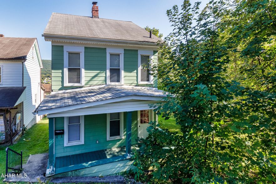 Tucked away - this move in ready, adorable home, remodeled in 2017,  has modern kitchen and bath, finished attic, off street and street parking. If this sounds like something you like, call today for a showing appointment.