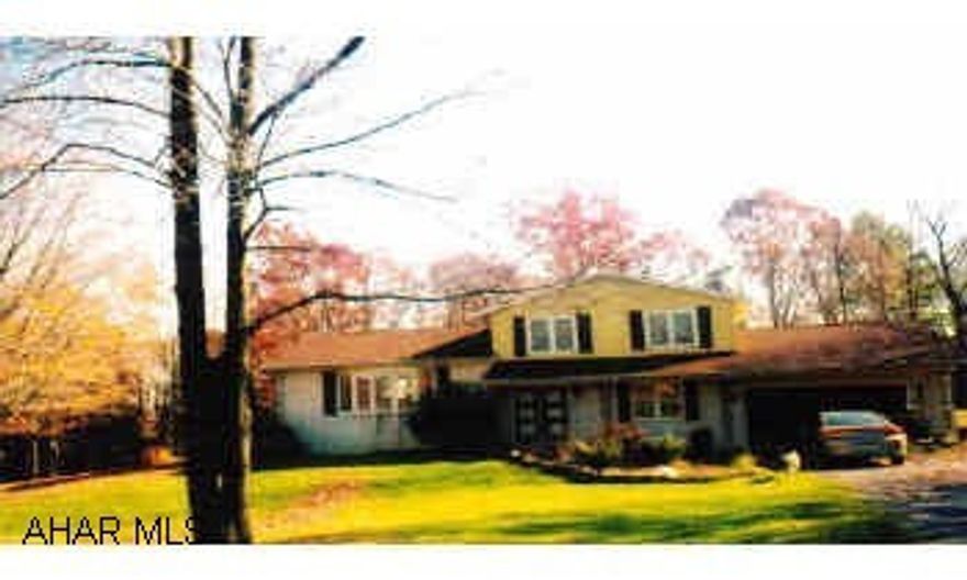 4 level split with 4 bedrooms, 4 baths, 2 family rooms both have fireplaces, on 3.5 acres. Excellent condition. Harmony School. Survey in office. 4 level split with 4 bedrooms, 4 baths, 2 family rooms both have fireplaces, on 3.5 acres. Excellent condition. Harmony School. Survey in office.