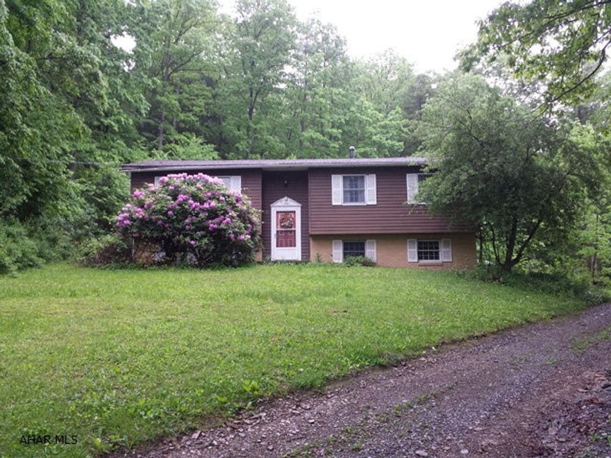 Lots of potential.  3 bedroom bi-level on 5.17 acres. Partially finished basement. Need some TLC.  Furnace and well pump need work.
