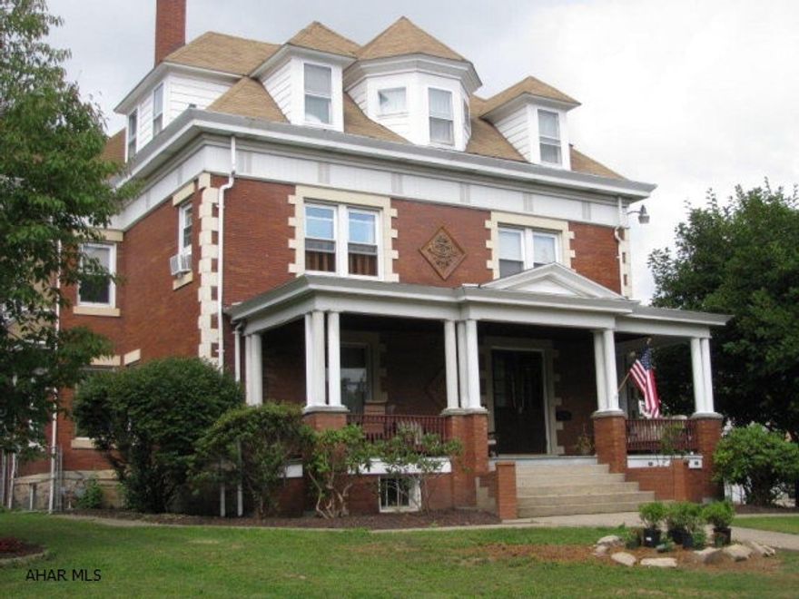 Stately Brick Clearfield Home!! Pillared front porch,unique tile plaque and original double front doors welcome you! This home offers hardwood floors, wood paneled walls, pocket doors, stained glass windows and original woodwork thru-out!! Spacious rooms and 10 ft ceilings! LR, DR, EIK, Den, 1st flr laundry & powder room plus 6 bedrooms and 3 full baths!! Large fenced yard and 2 car attached garage!! Don't miss this opportunity to own this one of a kind home today!